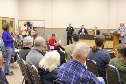 Deb Martin uses a public forum to ask Rep. Glenn Grotham to protect foreign aid funding. Photo: courtesy of Glen Grotham