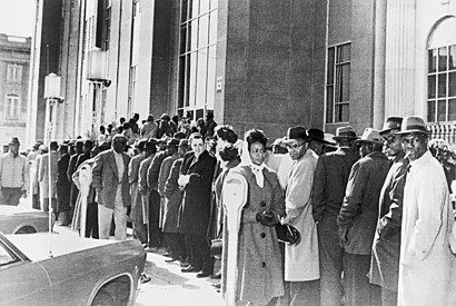 African Americans, waiting to register to vote, form a long line outside the Dallas Courthouse in Selma, Alabama, February 1965. New York World-Telegram and the Sun Newspaper Collection, Prints and Photographs Division, Library of Congress. 