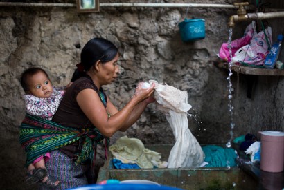 Catarina Pascual Jimenez visits families in her neighborhood asking for odd jobs such as washing clothes and menial labor in order to earn a few Quatzales (Guatemalen currency). Joseph Molieri/Bread for the World.