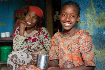 An Ethiopian mother and her daughter. The family has one cow that provides them with milk to drink and what’s left over they sell in the market. Kelley Lynch for Bread for the World.