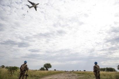 UN peace keepers provide security as the World Food Program drops food in Bentiu, South Sudan in 2015. Photo courtesy of the World Food Programme.