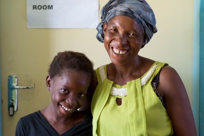 Mary Lungu, 11, is HIV-positive and visits St. Francis Hospital in eastern Zambia with her mother, Prisca, for regular checkups, which includes questions about her diet. Joseph Molieri/Bread for the World.