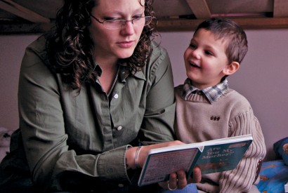 Heather Rude-Turner, reading to her son Isaac, depends on the Earned Income Tax Credit to help support her family. Laura Elizabeth Pohl/Bread for the World.