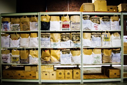 Bags of nonperishable food items line the warehouse shelves of the Lancaster County Council of Church’s food pantry also known as the “Food Hub.” Joseph Terranova for Bread for the World.