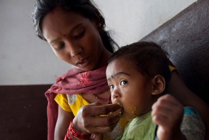 Sharmila Chaudhari feeds her daughter Sanjana, 19 months, at the Nutrition Rehabilitation Home in Dhangadhi, Nepal. Photo: Laura Pohl / Bread for the World