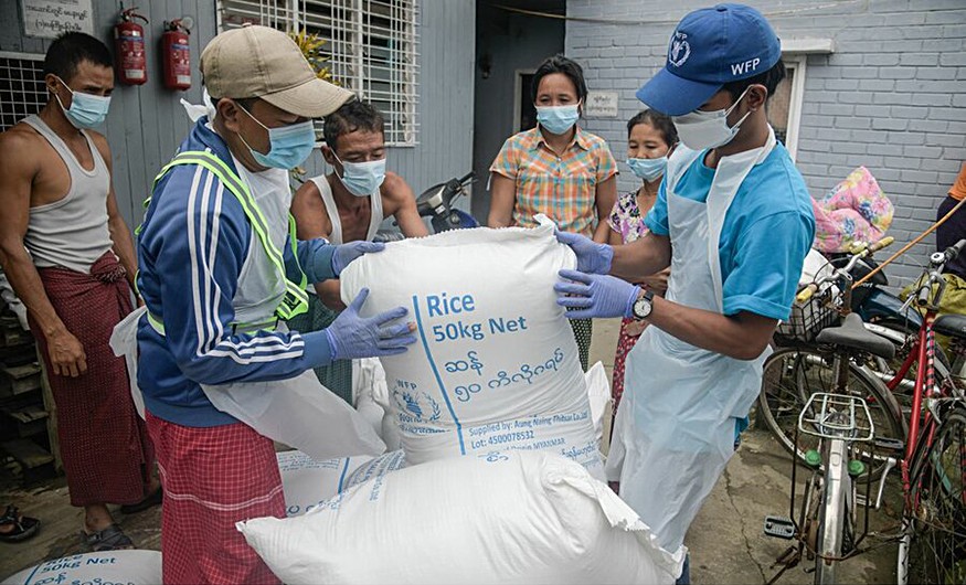 WFP distributes food in Yangon in August as part of its urban emergency response. WFP/PhotolibraryProduction