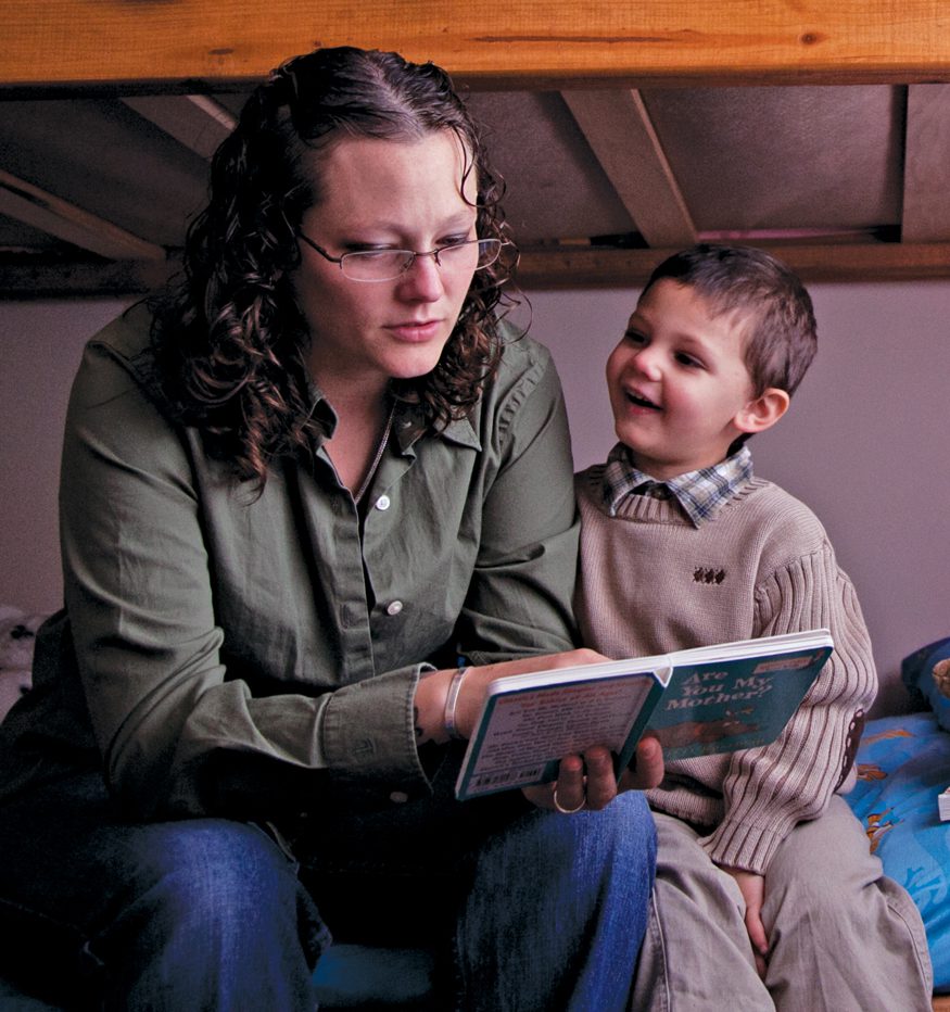 Heather Rude-Turner, reading to her son Isaac, depends on the Earned Income Tax Credit to help support her family. Laura Elizabeth Pohl/Bread for the World.