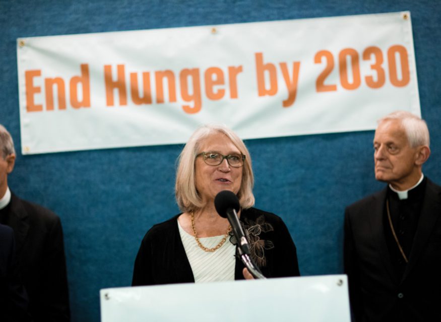 Rev. Dr. Sharon E. Watkins, at the podium, speaking about ending hunger by 2030. Photo: Zach Blum for Bread for the World