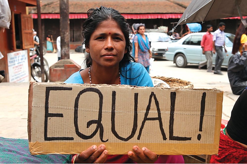 A woman in Nepal spells out what is on her mind about women’s empowerment. Stephan Bachenheimer/World Bank