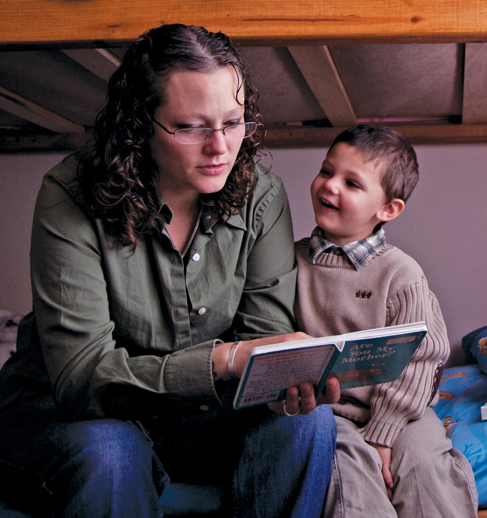 Heather Rude-Turner, reading to her son Isaac, depends on EITC (earned income tax credit) to help support her family. Laura Elizabeth Pohl/Bread for the World.