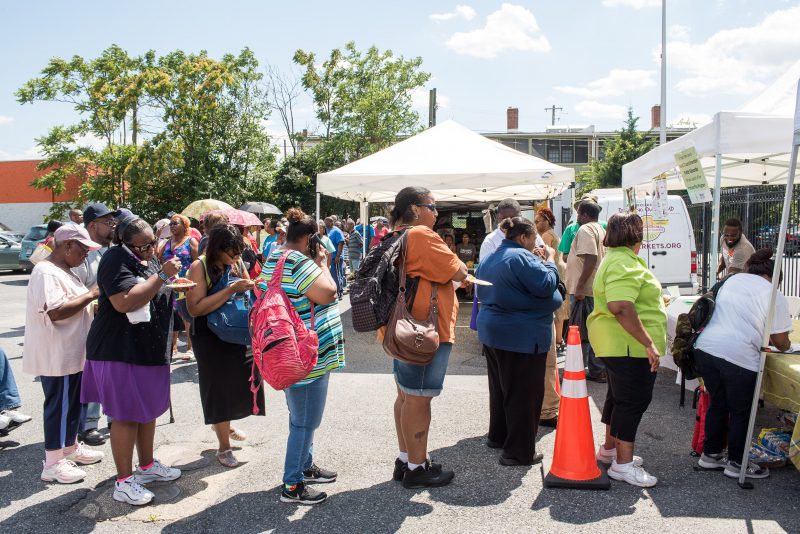 Washington D.C. residents participate in an incentive program that makes produce at farmer’s markets more affordable for low-income residents as part of the Affordable Care Act. Joseph Molieri/Bread for the World.