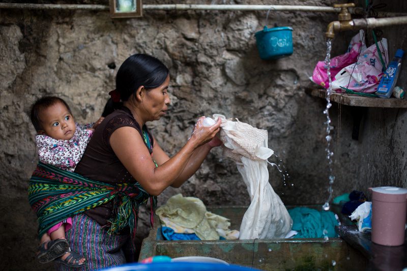 Catarina Pascual Jimenez visits families in her neighborhood asking for odd jobs such as washing clothes and menial labor in order to earn a few Quatzales (Guatemalen currency). Joseph Molieri/Bread for the World.