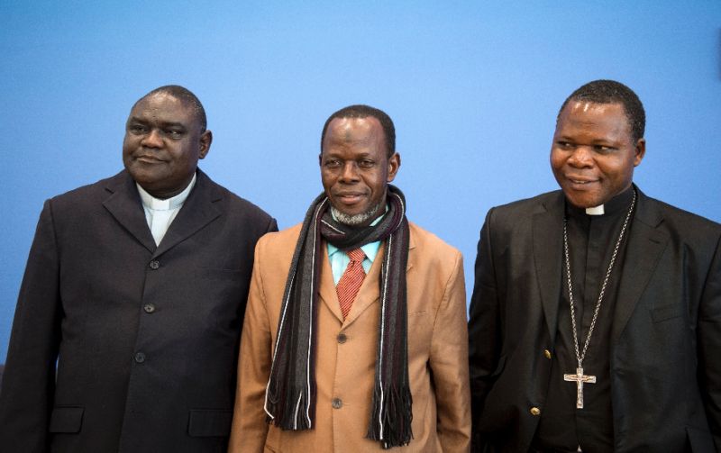 From left to right, Pastor Nicolas Guerekoyame Gbangou, Imam Oumar Kobine Layama, and Archbishop Dieudonne Nzapalainga. AFP Photo/Johannes Eisele.