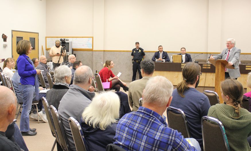 Deb Martin uses a public forum to ask Rep. Glenn Grotham to protect foreign aid funding. Photo: courtesy of Glen Grotham