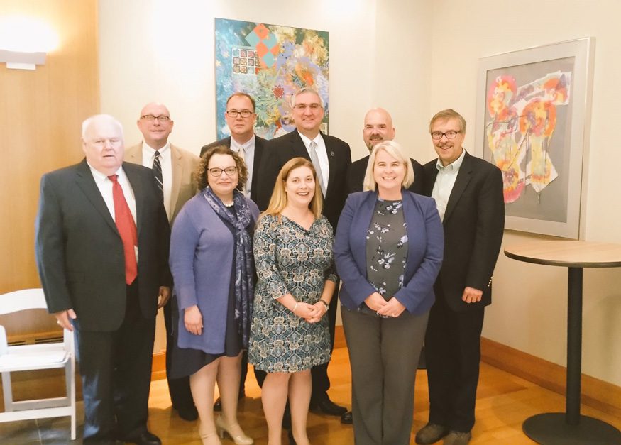 Indiana Hunger Network leaders, including Dave Miner, far right, meet with Gov. Eric Holcomb to discuss collaborations to end hunger.